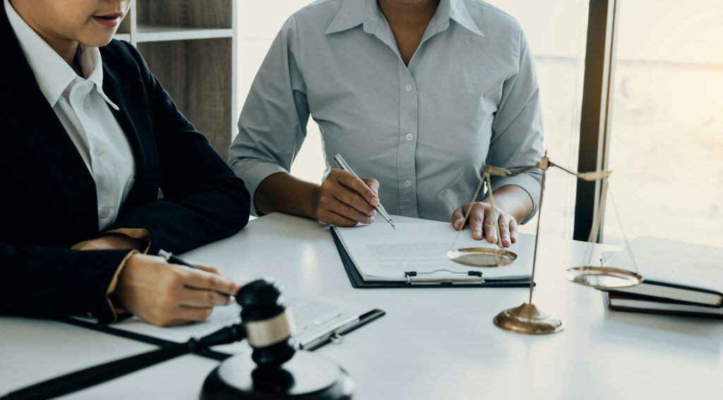 Business lawyer is currently counseling the client's trial at the lawyer office.