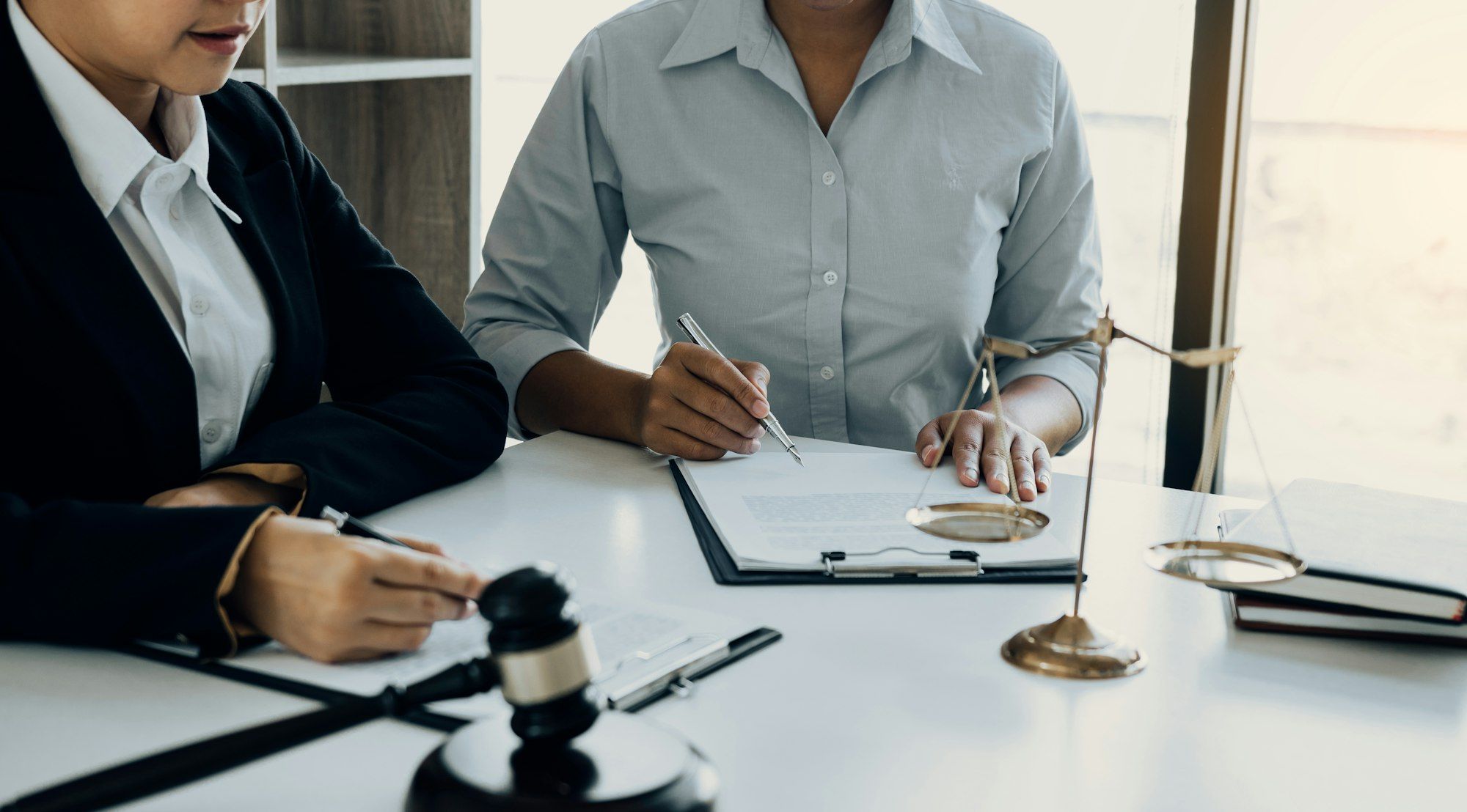 Business lawyer is currently counseling the client's trial at the lawyer office.